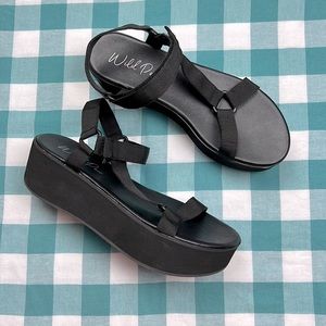 Wild pair black platform sandals size 8.5